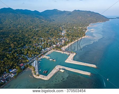 Aerial View Of Baan Tai Pier Or Huatean Pier At Phangan Island With Clear Blue Sky, Thailand