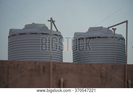 Twin White Sintex Water Tank On The Roof Of A House Or Industrial Building On Roof Top Or Deck. : Ud