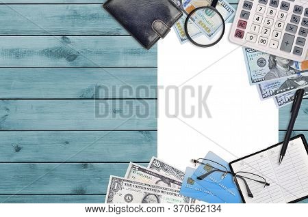 Office Flat Lay Composition With Calculator, Address Book And Other Office Items On Brown Wooden Tab