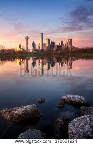 Dallas City Skyline At Sunset. Beautiful Sunset After A Heavy Rain In North Texas. Reflection Of Dow