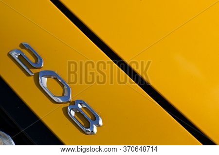 Bordeaux , Aquitaine / France - 05 14 2020 : New Peugeot 208 Gold Logo Sign Yellow Automobiles Car P