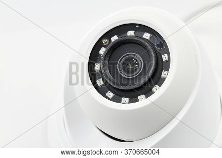 Dome Secure Camera On Light Background With Motion Sensors. Video Surveillance Camera. Closeup, Sele