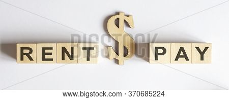 Wooden Blocks With The Word Rant Or Pay . Make The Right Decision. Real Estate Concept. Rent Apartme