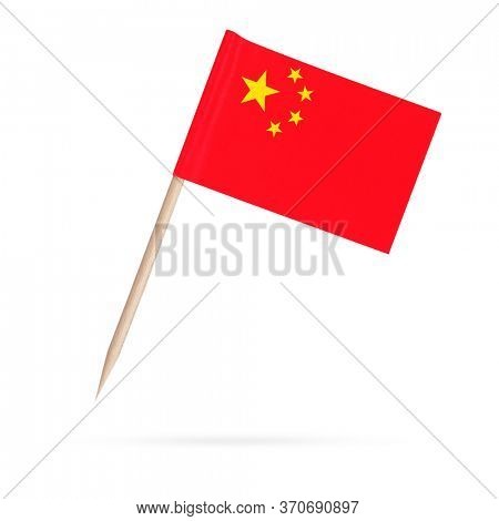 Miniature paper flag China. Isolated Chinese toothpick flag pointer on white background. With shadow below
