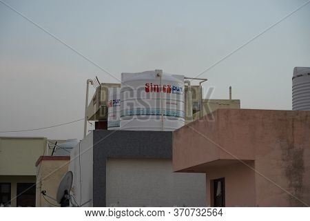 Twin White Sintex Water Tank On The Roof Of A House Or Industrial Building On Roof Top Or Deck. : Ud