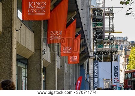 London - September 23, 2019: King's College London Flags Hanging Above The Kcl Entrance To The Stran