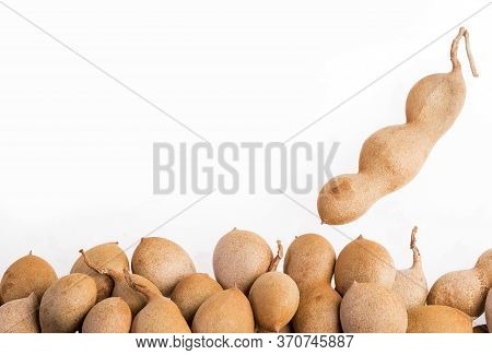 Tamarind Tropical Fruit - Tamarindus Indica. White Background