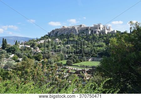 Athens, Greece - October 14, 2015: Acropolis Rock And Temple Of Parthenon As Seen From The Archaeolo