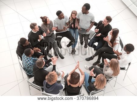 Speaker Giving a Talk at Business Meeting. Audience in the confe