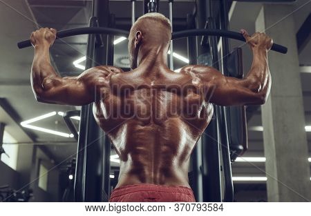 Fitness Man Doing Pull-ups Exercises