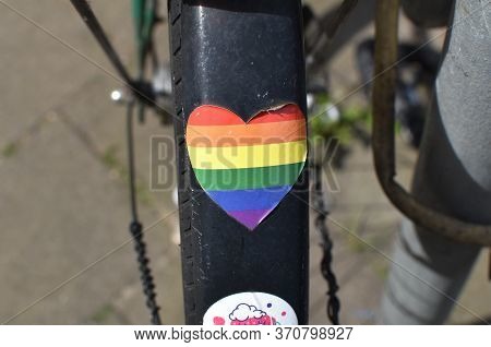 Lgbtq Support Expressed Through A Rainbow Flag Sticker On A Bike Fender