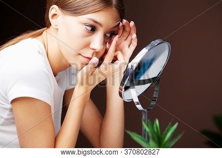 Contact Lenses For Vision. Young Woman Applies Contact Lenses