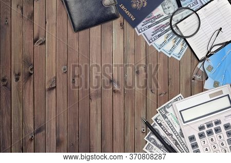 Office Flat Lay Composition With Calculator, Address Book And Other Office Items On Brown Wooden Tab