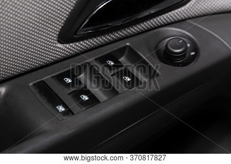 Novosibirsk/ Russia - April 28, 2020: Chevrolet Cruze, Close-up Of The Side Door Buttons: Window Adj