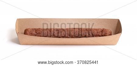 One Frikadel, A Dutch Fast Food Snack On A Paper Tray