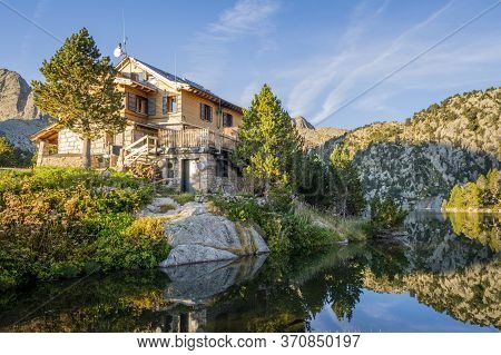 Espot, Spain, September 2015: View On Jm Blanck Mountain Hut In The Spanish Pyrenees During Golden H