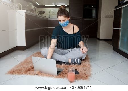 Young Woman In Protective Mask Going To Do Sports Online, Stay Isolation At Home For Self Quarantine