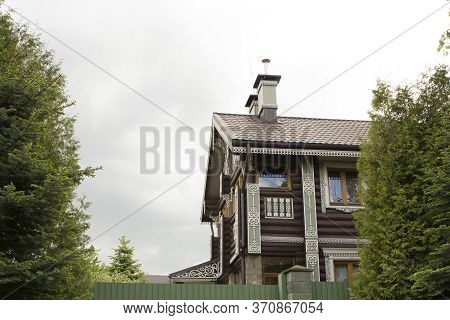 Beautiful Rich Private Wooden House In The Old Russian Style, With Carved Platbands, Windows, Shutte