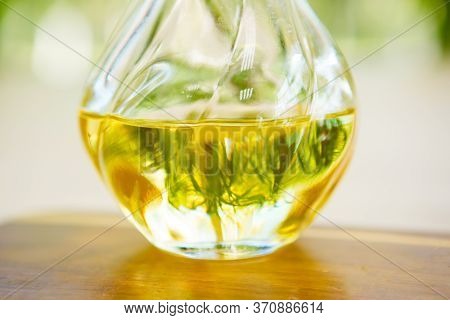 Olive Oil On Wooden Surface. Sunny Day