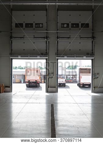 Open Loading Cargo Doors In Distribution Warehouse