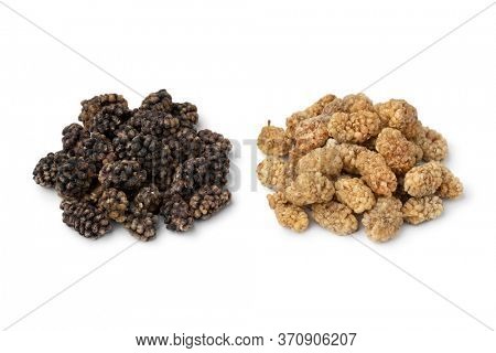 Heap of dried black and white mulberries isolated on white background