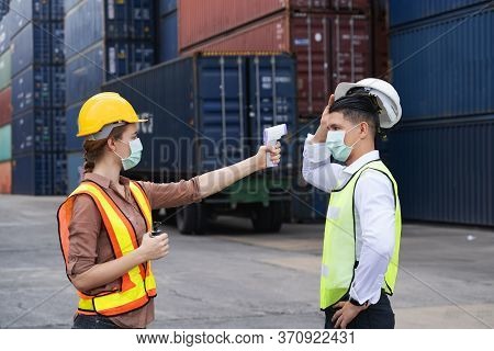Engineer Worker Waring Surgical Mask Checking Body Temperature Using Infrared Digital Thermometer Ch