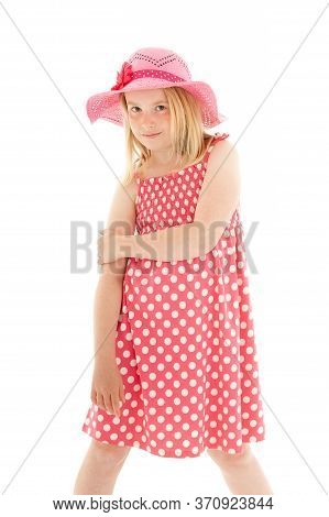 Beautiful Young Blonde Girl Wearing Big Pink Floppy Hat And A Polka Dot Dress. Isolated On White Stu