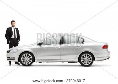 Businessman standing and chacking a new silver car isolated on white background