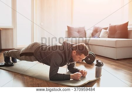 Young Ordinary Man Go In For Sport At Home. Full Size Pictrue Of Freshman In Workout And Beginner Gu