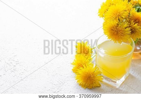 Dandelion Tea. Yellow Summer Flowers Dandelions. Tea Party Homemade Drink. Certified Flower Tea. An 