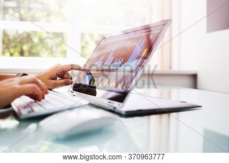 Online Business Analytics And Kpi Dashboard On Laptop