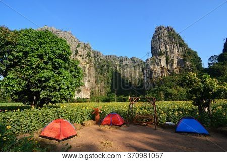 Orange, Red, Blue Camping Tent At Sunflower Field, Ban Mung, Noen Maprang District, Phitsanulok Prov