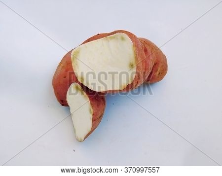 Broken Pink Color Sweet Potato Isolated In A White Background. This Is The Main Food In Pongal Or Ma