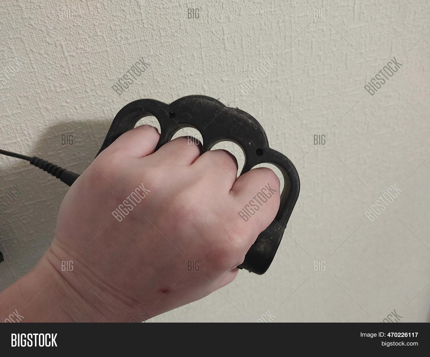 Taser Brass Knuckles Image & Photo (Free Trial) Bigstock
