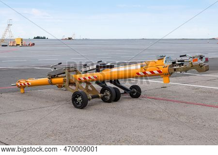 Towbar For Pushback Aircrafts At The Airport Apron