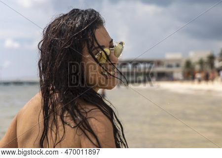 Young Woman With Sexy Smile Enjoying The Caribbean Sea On The White Sandy Beach Of Playa Del Carmen