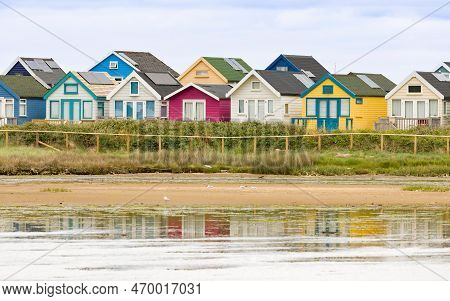 Row Of Beach Houses, Holiday Homes At The Coast On Hengistbury Head, Dorset, Uk