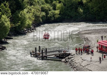 Shotover River, Queenstown, New Zealand - 20th December 2022: A Shotover Jetboat Full Of Passengers 