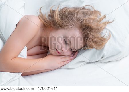 Morning Sleep. Little Boy Sleeping In Bed. Cute Kid Sleeping Well Alone In Bed Under Blanket. Kid Ly