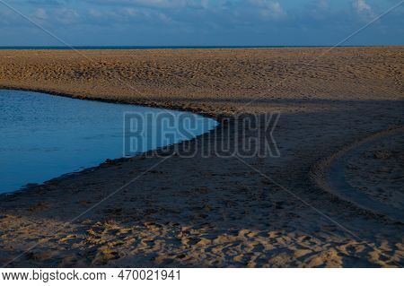 A Beautiful Tropical Deserted Beach During Sunrise.