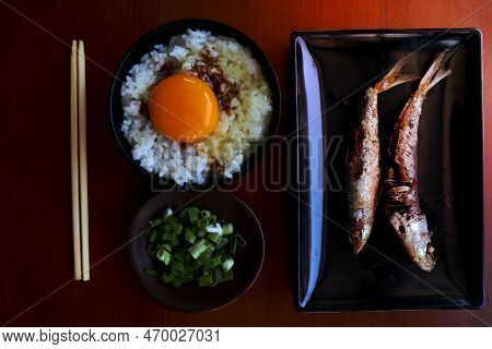 Tamago Kake Gohan Or Raw Egg On Rice. Traditional Food From Japan, Eat On Breakfast
