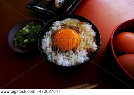 Tamago Kake Gohan Or Raw Egg On Rice. Traditional Food From Japan, Eat On Breakfast