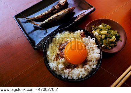 Tamago Kake Gohan Or Raw Egg On Rice. Traditional Food From Japan, Eat On Breakfast