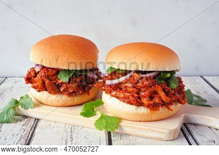 Jack Fruit Meatless Burgers Against A Bright Background. Healthy Eating, Plant-based Pulled Pork Mea