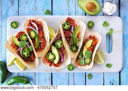 Jack Fruit Vegan Tacos. Top Down View Table Scene Over A Rustic Blue Wood Background. Healthy Eating