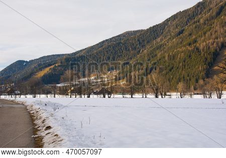 The Snowy December Landscape Near Gnesau In The Upper Gurk Valley In The Gurktal Alps, Carinthia, Au