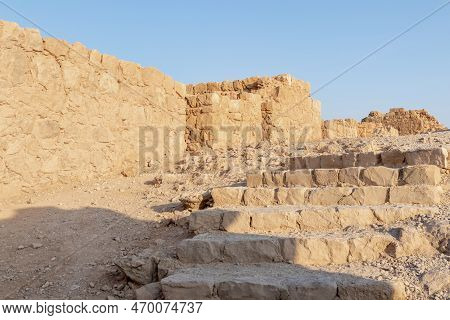 The Remains Of Internal Buildings In The Rays Of The Rising Sun In The Ruins Of The Fortress Of Masa