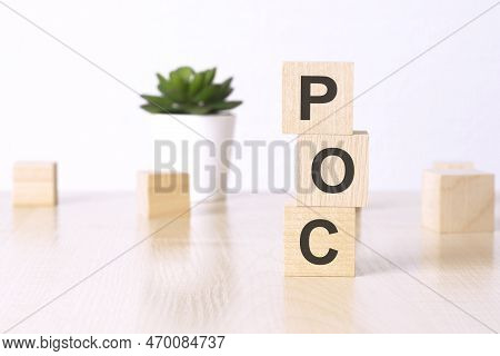 Poc - Proof Of Concept - Text On Wooden Cubes On A White Background