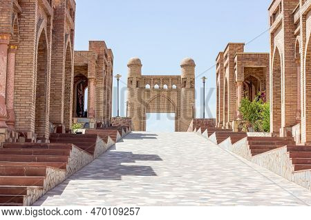 Hisor, Tajikistan - July 31, 2022: Ancient Hisor Fort In Summer Against The Blue Sky.