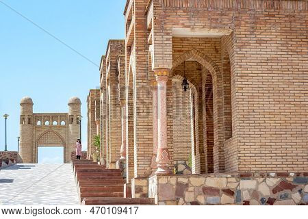 Hisor, Tajikistan - July 31, 2022: Ancient Hisor Fort In Summer Against The Blue Sky.